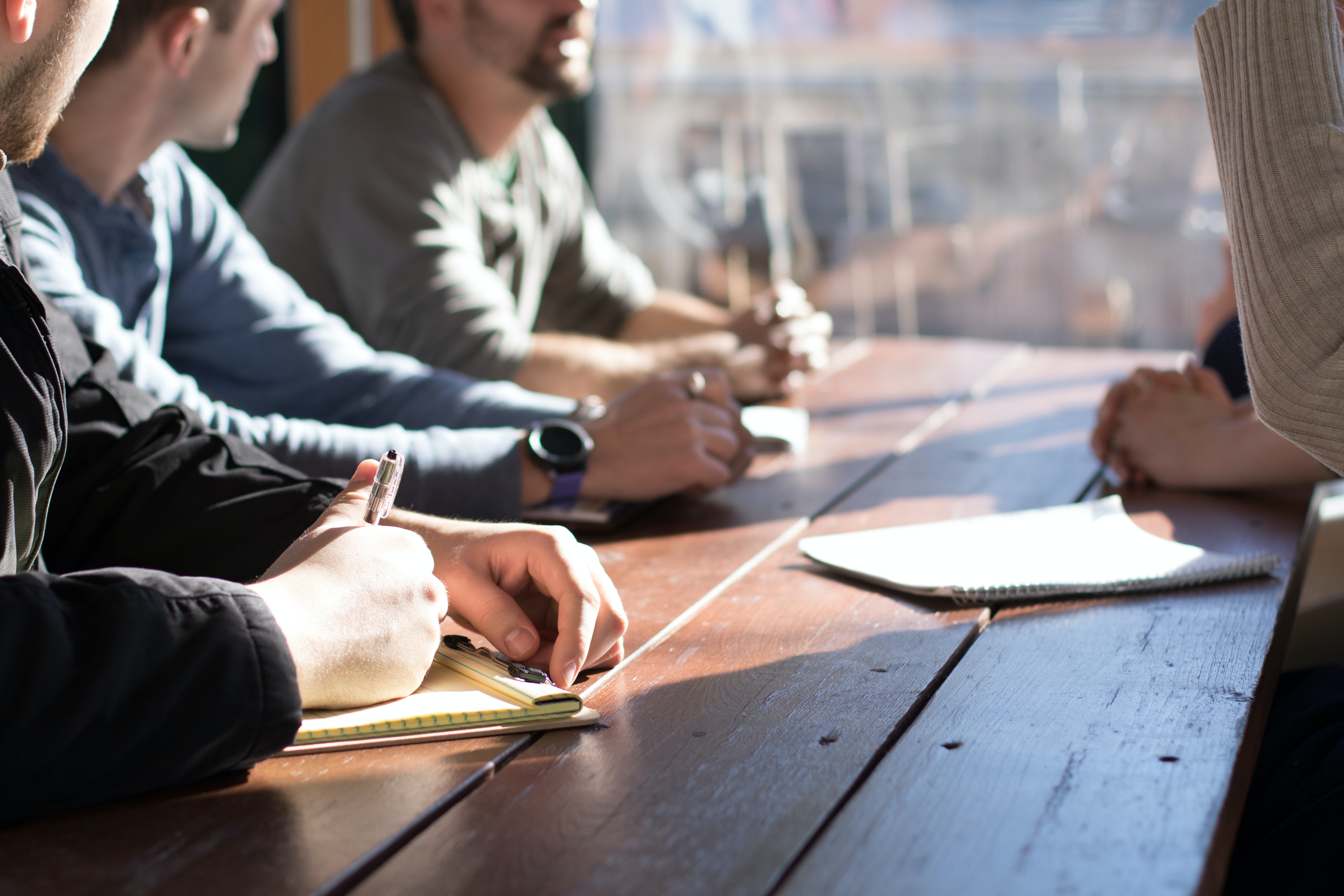 A group of professionals meeting.